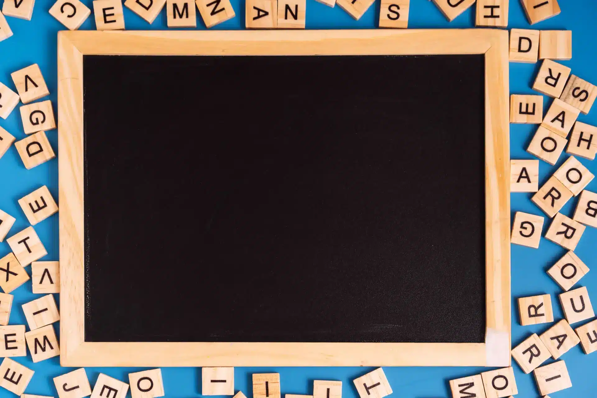 chalk-board-with-english-letters-on-blue-backgroun-2023-11-27-05-30-11-utc